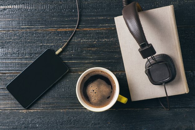 Concept audio books on a dark wooden table