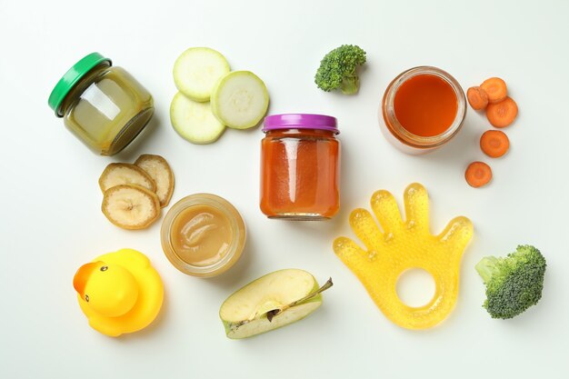 Concept of baby food on white background