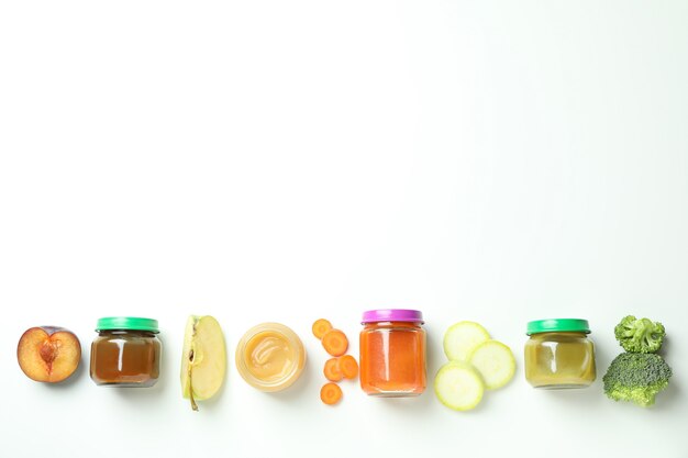 Concept of baby food on white background