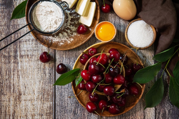 Concept baking seasonal Ingredients for cherry pie Top view