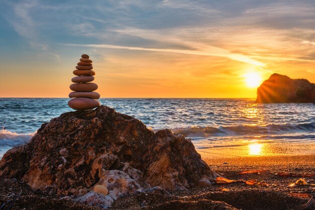 Photo concept of balance and harmony stone stack on the beach