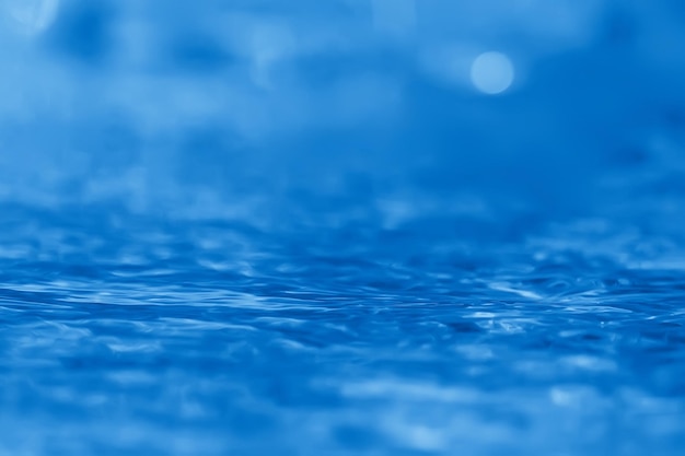 concept blue abstract background water / ocean, lake waves on water, reflection of ripples on the river