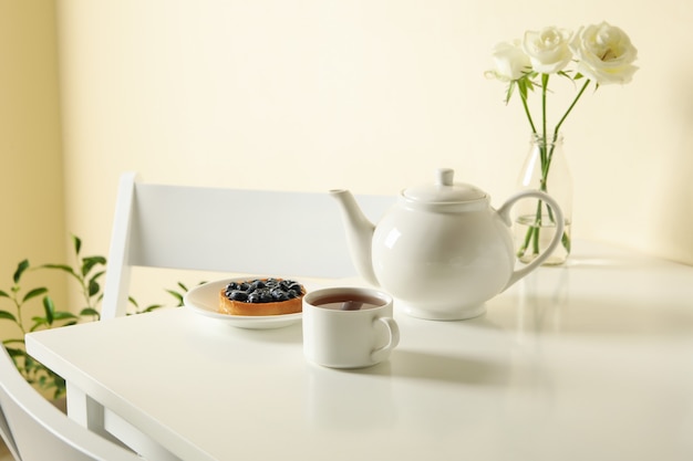 Premium Photo | Concept of breakfast with blueberry pie on white table