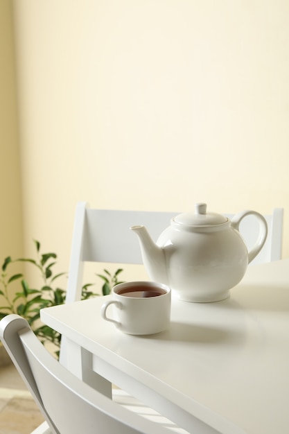 Concept of breakfast with tea on white table