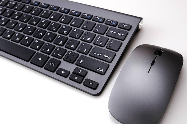 The concept of business education programming people and technology closeup of the keyboard and mouse