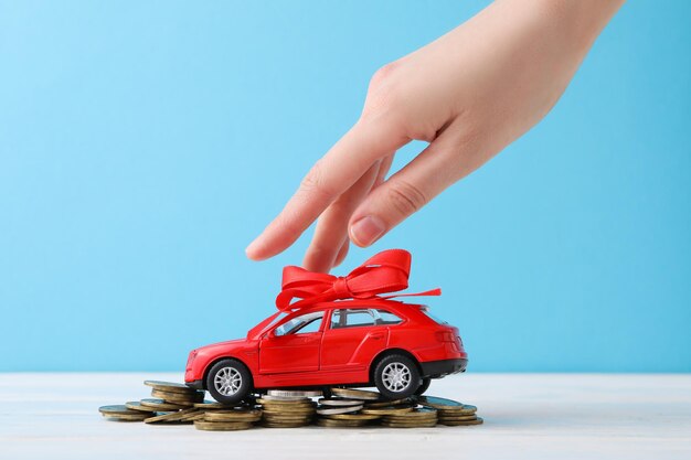 Concept of buying a car with toy car