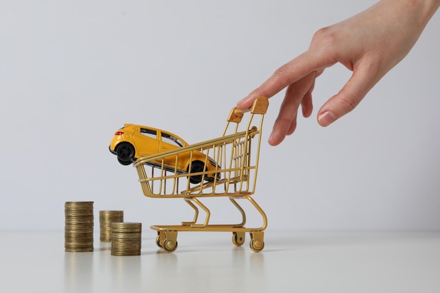 Concept of buying a car with toy car