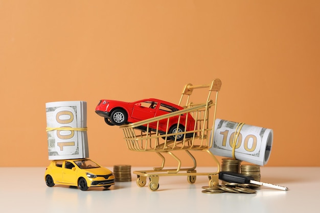 장난감 자동차로 자동차 구매 및 보험의 개념