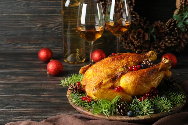 Concept of Christmas roast turkey on wooden table