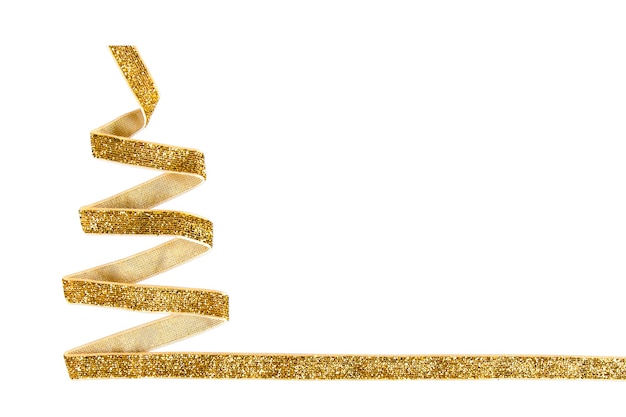 Photo concept christmas tree made of golden ribbon isolate