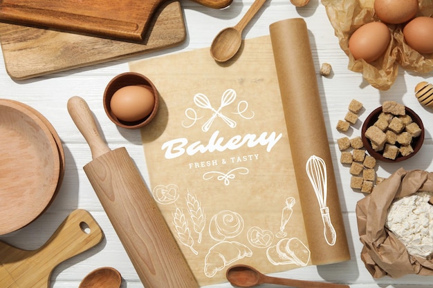 Concept of cooking bakery products composition on white wooden background
