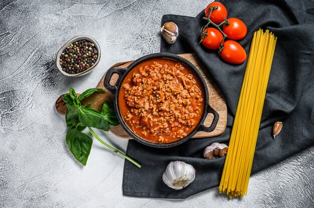 The concept of cooking Pasta bolognese spaghetti with tomatoes