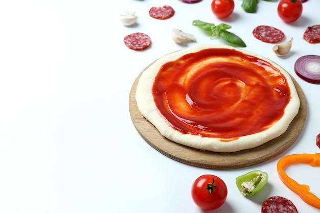 Concept of cooking pizza on white background