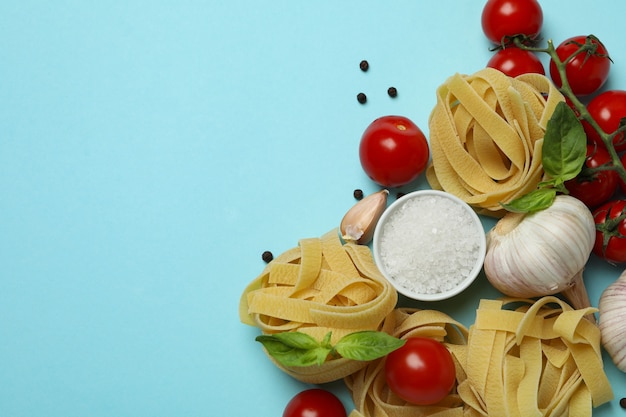 Concept of cooking tasty pasta on blue