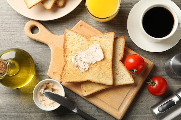 Concept of cooking toast on gray table