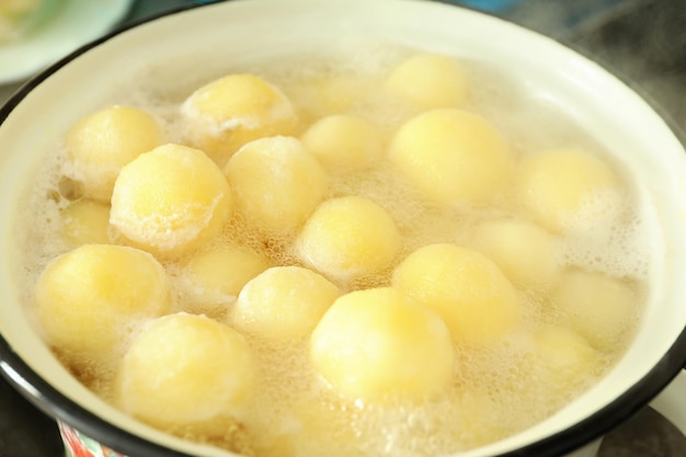 Concept of cooking with boiled young potatoes