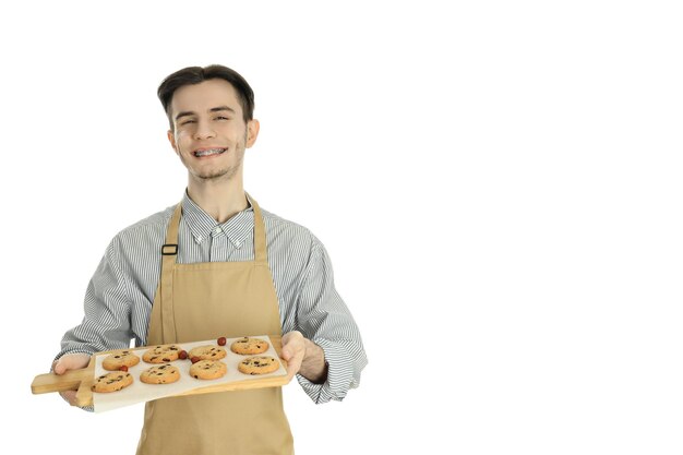 Concept of cooking with young attractive man isolated on white background