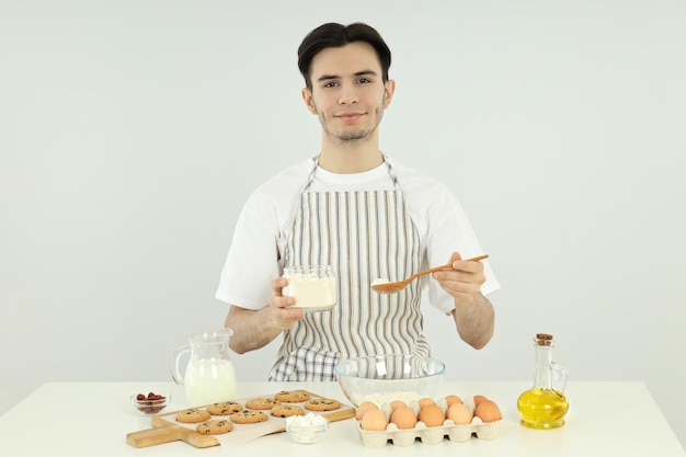 Concept of cooking with young attractive man