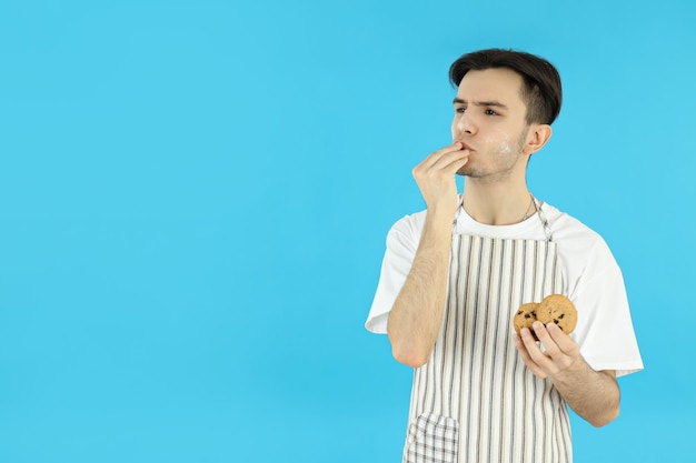 Concept of cooking with young attractive man