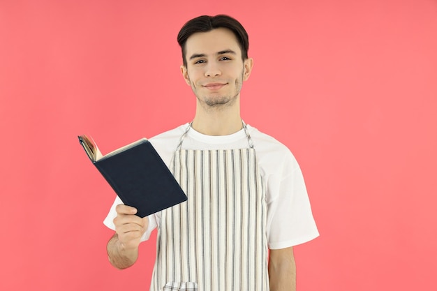 Concept of cooking with young attractive man