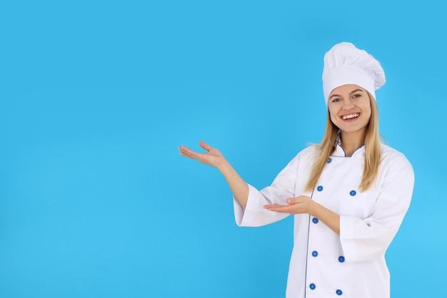 Concept of cooking with young woman space for text