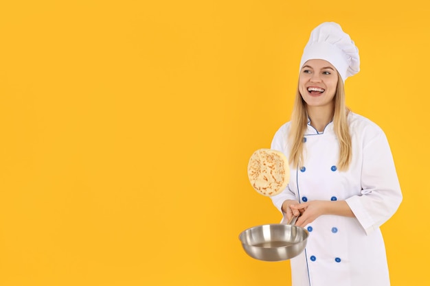 Concept of cooking with young woman space for text