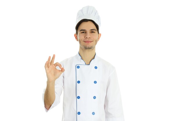 Concept of cooking young male chef isolated on white background