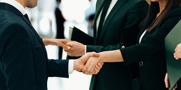 Concept of cooperation.handshakes when meeting business partners