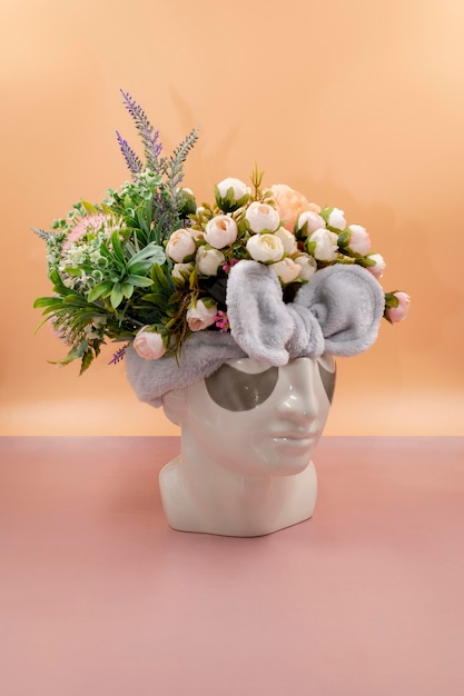 Concept of cosmetic procedures for women white vase in with eye mask