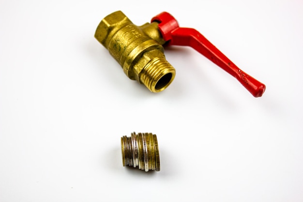 The concept of the cost of heatingValve and money Plumbing services price Installation repair of plumbing equipment