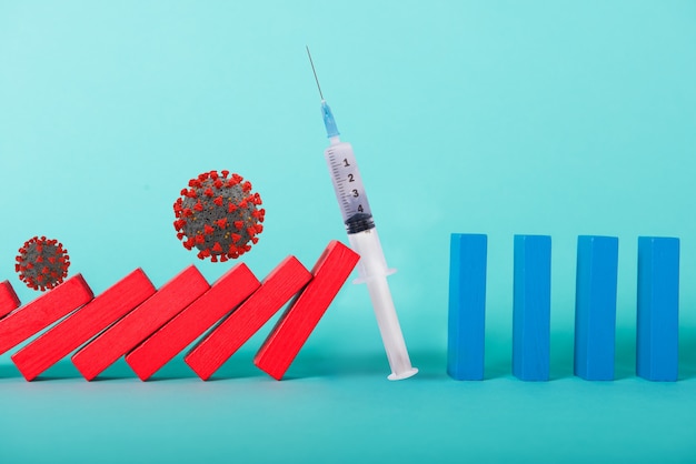 Concept of covid19 coronavirus pandemic with falling chain like a domino game. Contagion and