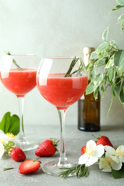 Concept of delicious drink with Rossini cocktail on gray textured table