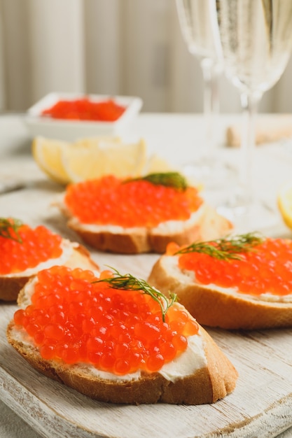 Concept of delicious eat with sandwiches with red caviar