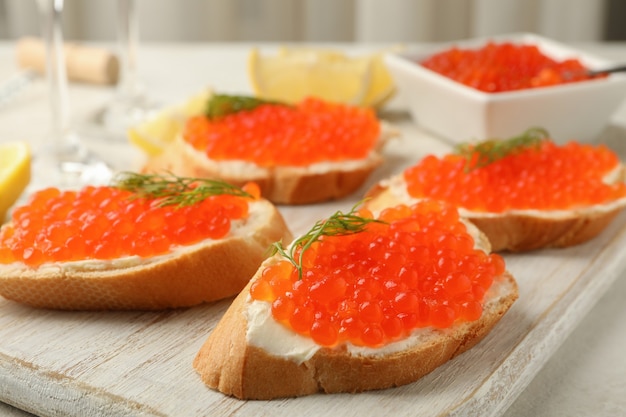 Concept of delicious eat with sandwiches with red caviar