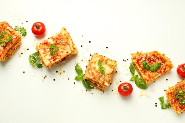 Concept of delicious food with lasagna on white background