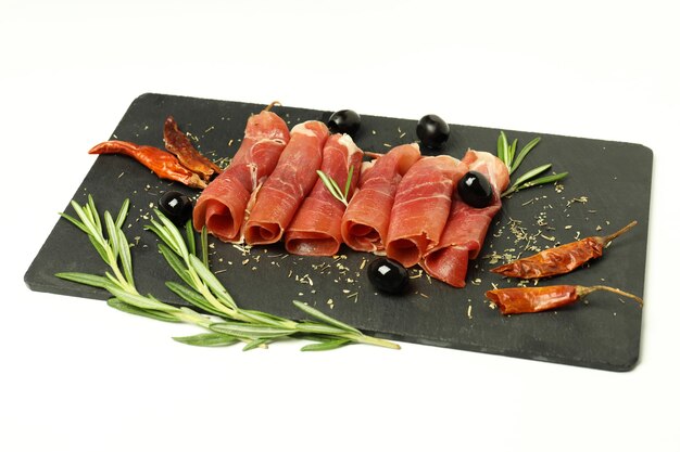 Concept of delicious Spanish cuisine jamon on white background