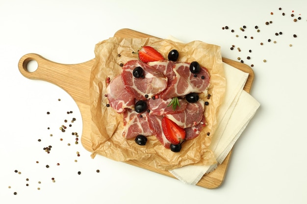 Concept of delicious spanish cuisine jamon on white background