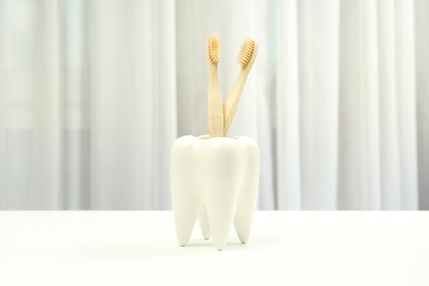 Concept of dental care or tooth care on white table