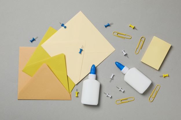 Concept of different office stationery with glue