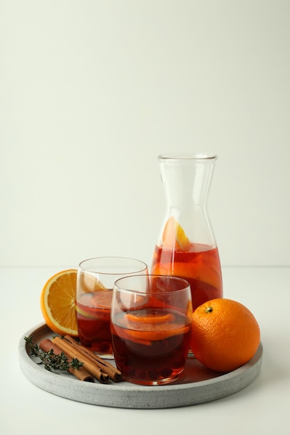 Concept of drink with Sangria on white table