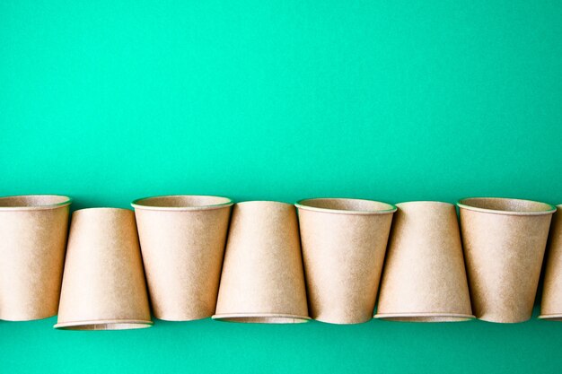 the concept of eco fast food with cardboard cups of eco-friendly material isolated