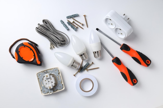 Concept of electrician or electrical tools on white background