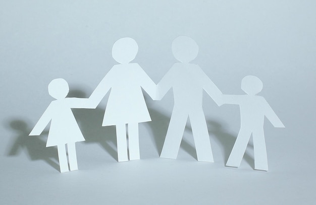 Concept of familyhappy family of paper men