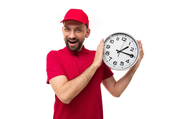 Concept of fast delivery in short deadlines courier in a red uniform on a white background with a