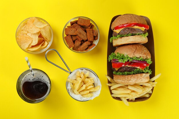 Photo concept of fast food on yellow background