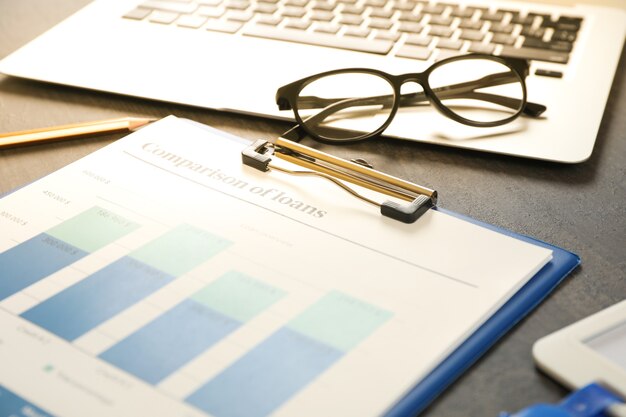 Photo concept of finance planning on black wooden table