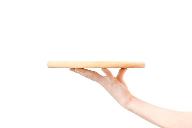 Concept of food serving service female hand holding a wooden board on a white background in closeupxA