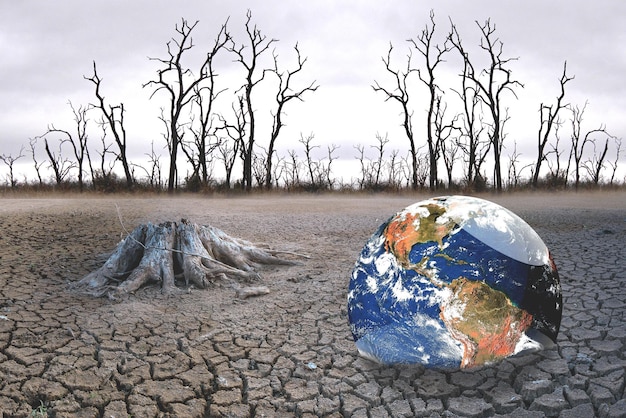 Photo the concept of global warming and drought and poverty and food shortages arid soils with hot climates have a globe that lacks green space