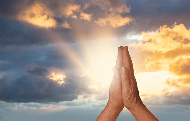 The concept of God`s salvation:Human hands open palm up worship