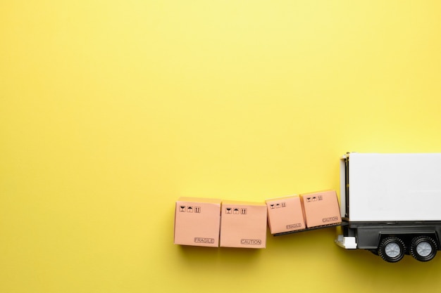 concept of goods loading a truck of a courier company for sending.